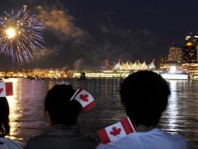 VANCOUVER, B.C.: JULY 1,  2011 –   Colour lit up the night sky over Canada Place and the harbour in Vancouver, B.C. on July 1, 2011 as thousands stopped to watch the Canada Day fireworks.     (Stuart Davis/PNG)      (For SUN and PROV story)  -- SUN0701N FIREWORKS 02     TRAX NUMBER   00053329G and 00053329D.