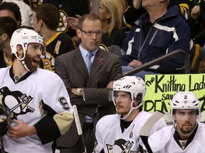 Pittsburgh Penguins coach Dan Bylsma fails to rally the troops in game 4 of the Eastern Conference final against Boston on June 7, 2013. Getty Images photo.