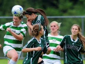 The Argyle Pipers topped the Oak Bay Breakers (stripes) 1-0 in Saturday's BC girls Triple A soccer final in North Vancouver. (Nick Procaylo, PNG photo)