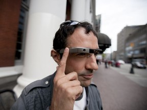 Bradley Shende, Technology specialist stopped to experiment with Google Glass outside Waterfront station, May 15, 2013.  (MARK YUEN, VANCOUVER SUN) [PNG Merlin Archive]