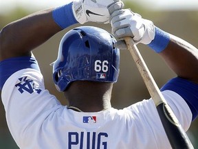 la-sp-dn-dodgers-yasiel-puig-20130326-001