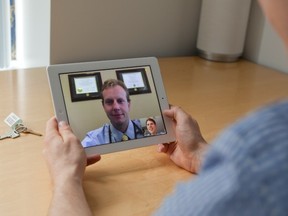 Medeo CEO Ryan Wilson connects via video chat on an iPad with Dr. Jesse Pewarchuk, one of the company’s founders and chief medical officer. (SUBMITTED PHOTO)