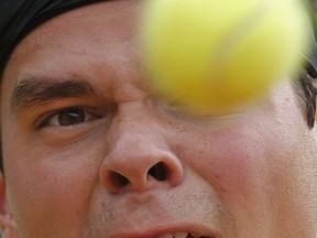 Canada's Milos Raonic, here in action recently at the French Open, lost to France's Gael Monfils Tuesday at the Gerry Weber Open in Halle, Germany. AP photo.