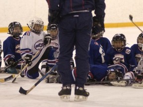 Too many people, unfortunately, still think minor hockey in Canada is like what they see on television with the NHL. But it’s all about kids playing safely, respecting others, making friends and having a great time. (ARLEN REDEKOP/PNG FILES)