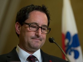 Montreal Mayor Michael Applebaum announces that he is resigning at City Hall in Montreal on Tuesday. (POSTMEDIA NEWS)