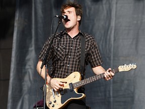 Jim Adkins of Jimmy Eat World performs live on the Main Stage during day two of Reading Festival 2011 on August 27, 2011 in Reading, England.  (Photo by Simone Joyner/Getty Images)