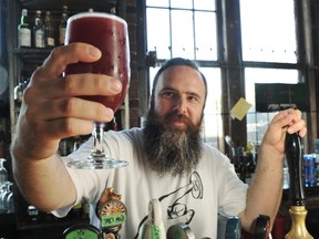 Nigel Springthorpe with a glass of what I'm guessing is Ian Hill's Raspberry Wheat Ale. (Photo: Wayne Leidenfrost/PNG)