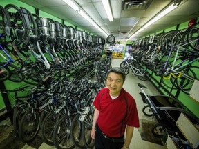 Bike-rental operators like Louis Kwan fear the city’s bike-share plan will kill their businesses. (Ric Ernst/PNG)