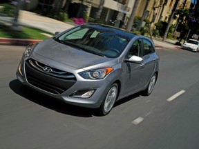 The Hyundai Elantra, which columnist Gordon Clark says sounds a female super hero, topped the Honda Civic in sales in the first five months of 2013 by being very similar to the long top-selling Honda Civic. (HANDOUT PHOTO)