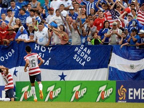 Landon Donovan of the U.S. soccer team celebrates a goal scored on July 21, 2013 against El Salvador in Baltimore. Getty Images photo.