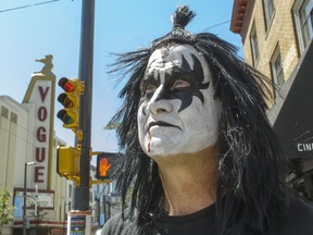 Kiss fan Glen Schaefer goes for a walk through uptown Vancouver after getting his KISS face on. (Ward Perrin/PNG)