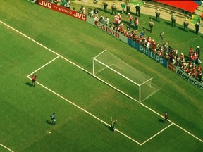 Italy's Roberto Baggio misses the decisive penalty kick as Brazil goalkeeper Claudio Taffarel celebrates at the 1994 World Cup final. Getty Images file photo.