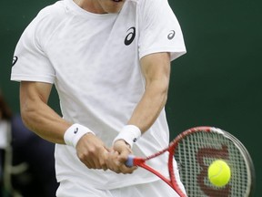 Canada's Vasek Pospisil in action at Wimbledon in July 2013. AP file photo.