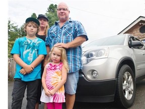 Andrew Scott, his wife Deanna and children Kyle, 10, and Kenzie, 4, were stranded on the side of the highway when Mounties impounded their SUV after stopping him for excessive speeding.