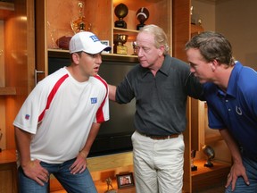 Eli, Archie and Peyton Manning did a Reebok ad back in 2008. They're back at it with a clever spoof for DirectTV. Getty Images photo.