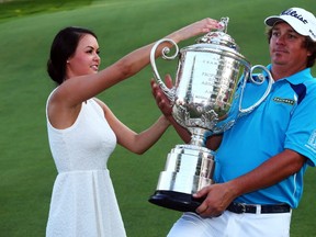 Jason Dufner and his wife Amanda at the PGA Championship on Aug. 11, 2013.
