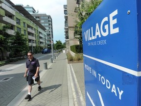 The City of Vancouver is expected to take a financial bath of more than $300 million on the Olympic Village condo project. Some 135 units remain unsold. (Jason Payne/PNG)