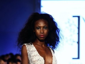 Supermodel of the Bahamas Patricka Ferguson strikes a pose in Vivid Haiku Meroe at last night's fashion show.
