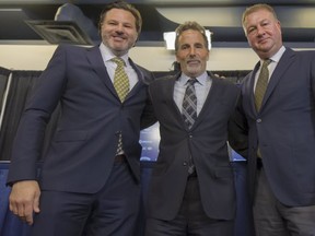 Canucks owner Francesco Aquilini, head coach John Tortorella and general manager Mike Gillis. Ward Perrin -- PNG photo.