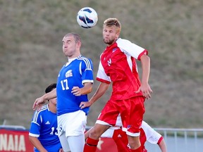 Johannes Hallman (right) and the rest of the Simon Fraser Clan rallied for a 2-1 win Thursday at Montana State Billings as the 2013 GNAC season opened. (Ron Hole, SFU athletics)