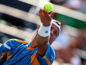 Lleyton Hewitt in action against Mikhail Youzhny at the U.S. Open Tuesday. Getty Images photo.