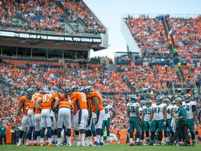 Peyton Manning of the Denver Broncos leads his team against the Philadelphia Eagles on Sept. 29, 2013.