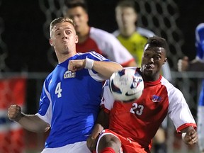 UBC's Matthew Cammish (left) and SFU's Joseph Martin battle during crosstown men's soccer clash Saturday atop Burnaby Mountain. (Ron Hole, SFU athletics)