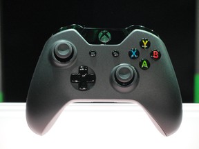 The new controller for Xbox One videogame console is seen at the Microsoft campus in Redmond, Washington, on May 21, 2013. Microsoft unveiled its eagerly awaited new generation Xbox One videogame console, touting it as a home entertainment hub that goes far beyond games. The beefed-up hardware is powered by software that allows for instant switching between games, television, and Internet browsing, according to Don Mattrick, head of Microsoft's interactive entertainment business. Skype was also integrated for online video calls.     AFP PHOTO/GlennCHAPMANGLENN CHAPMAN/AFP/Getty Images