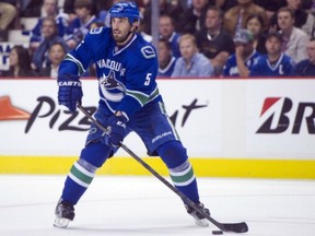 Jason Garrison will be front and centre on the Canucks' power play this season.  (Photo by Rich Lam/Getty Images)