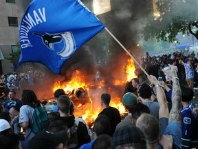 Several readers, in light of the 2011 Stanley Cup riot, are questioning the wisdom of increasing booze sales at hockey games and other sports events. (Jason Payne/PNG FILES)