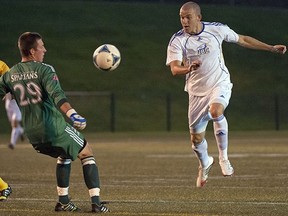 UBC Thumderbirds' Niall Cousens (right) is one of a half-dozen Birds with at least three goals on the season. (Richard Lam, UBC athletics)