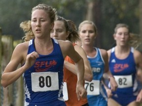 Simon Fraser’s Kirsten Allen finished sixth in a 99-runner field Saturday in Bellingham at the Western Washington University Cross Country Classic. Allen was the top Clan finisher and led SFU to second place in the team standings. (Photo – Nick Gonzales, The Western Front)