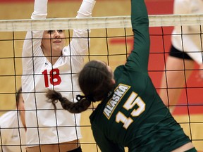 Simon Fraser right side Mackenzie Dunham attempts a block against visiting Alaska Anchorage during GNAC volleyball match at West Gym on Thursday. (Ron Hole, SFU athletics)