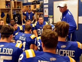 Amidst rumoursof the football program's potential demise, UBC Thunderbirds head coach Shawn Olson is keeping a steady hand in his team's huddle. (Richard Lam, UBC athletics)