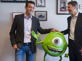 Vancouver Mayor Gregor Robertson, right, and Amir Nasrabadi during a tour of Pixar's Gastown studio. Disney announced the end of its Vancouver operations, which amounts to the loss of about 100 jobs. (Ward Perrin/PNG)