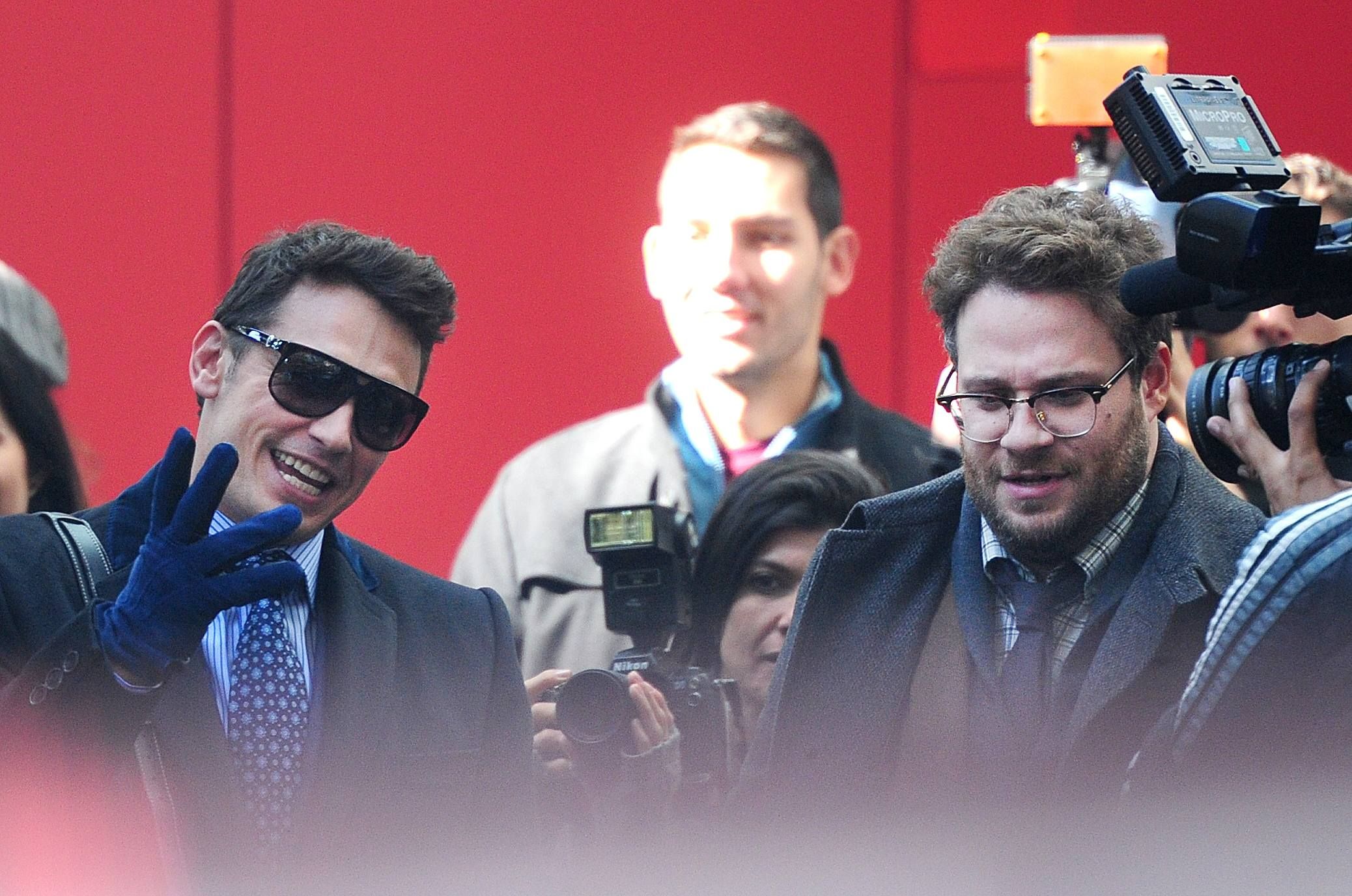 Actors James Franco and Seth Rogen in action on Homer Street in Vancouver while filming The Interview. (Nick Procaylo/PNG)