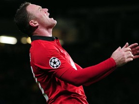 Can you read Wayne Rooney's body language? Wild guess: He can't believe he missed a scoring opportunity Wednesday in Champions League action against Real Sociedad.