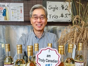Artistan sake maker Masa Shiroki at his Granville Island shop with sake made from rice grown in Abbotsford.
