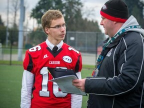 Carson Graham's Bobby Melville with coach John Buchanan. (PNG photo)