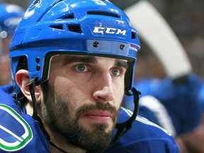 Jason Garrison hasn't scored in 24 games, so why not put him on the power-play point when the Canucks use four forwards. It's one less defender in the fact of those heavy slappers. (Getty Images via National Hockey League).