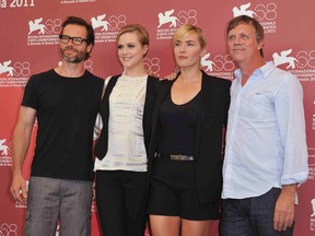 Director Todd Haynes (right) with Mildred Pierce cast members (from left) Guy Pearce, Evan Rachel Wood and Kate Winslet  at the Venice Film Festival in September, 2011. The mini-series gets a marathon screening Nov. 16 in Vancouver at the Cinematheque.  (Getty Images)