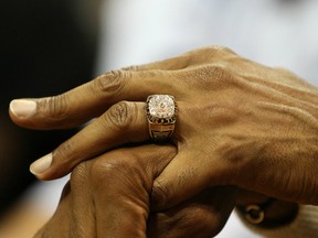 In searching for a photo of Julius Erving, a photo of his hands turned up. He was attending a first-round NBA playoff series in 2008. And the photographer decided to be artsy. Does it work? I'm not sure.
