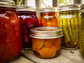 A variety of pickled veggies, including beets.