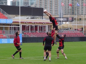 Tyler Ardron of Lakefield, Ont., catches a kickoff during practice at BMO Field in Toronto on Saturday November 2, 2013 ahead of Canada's rugby game Sunday against the touring Maori All Blacks. THE CANADIAN PRESS/Neil Davidson