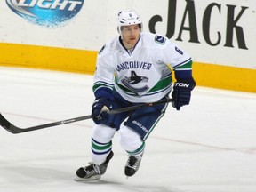 Yannick Weber has been recalled from the Canucks' AHL team. (Photo: Getty Images)