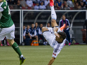 Whitecaps striker Camilo Sanvezzo scores a remarkable scissor-kick goal against the Portland Timbers.