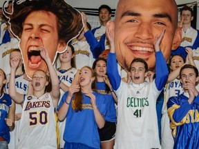 Putting their best faces forward, members of the Handsworth Royals' senior boys and girls basketball teams, as well as its Grade 9 boys, have fun with larger-than-life cutouts of two of B.C.'s current NBA players, Kelly Olynyk (left) and former Royals' grad Robert Sacre. (Blair Shier, Handsworth athletics)