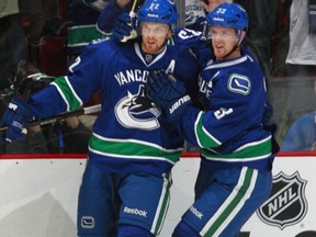 Daniel Sedin, left, has five points in his last five games. (Photo: Getty Images)
