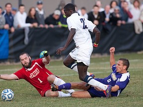 Mamadou Doudou Diouf playing against James Madison University. (Photo: today.uconn.edu)