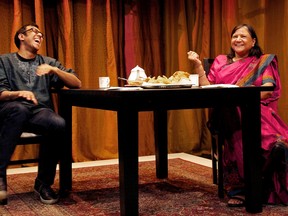 Ravi and Asha laugh about his life over tea and samosas in A Brimful of Asha. Photo by Erin Brubacher.